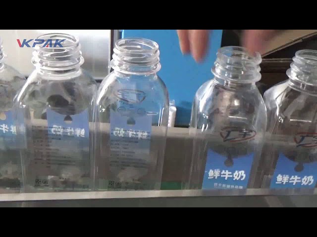 Автоматична двустранна машина за етикетиране на квадратни пластмасови бутилки